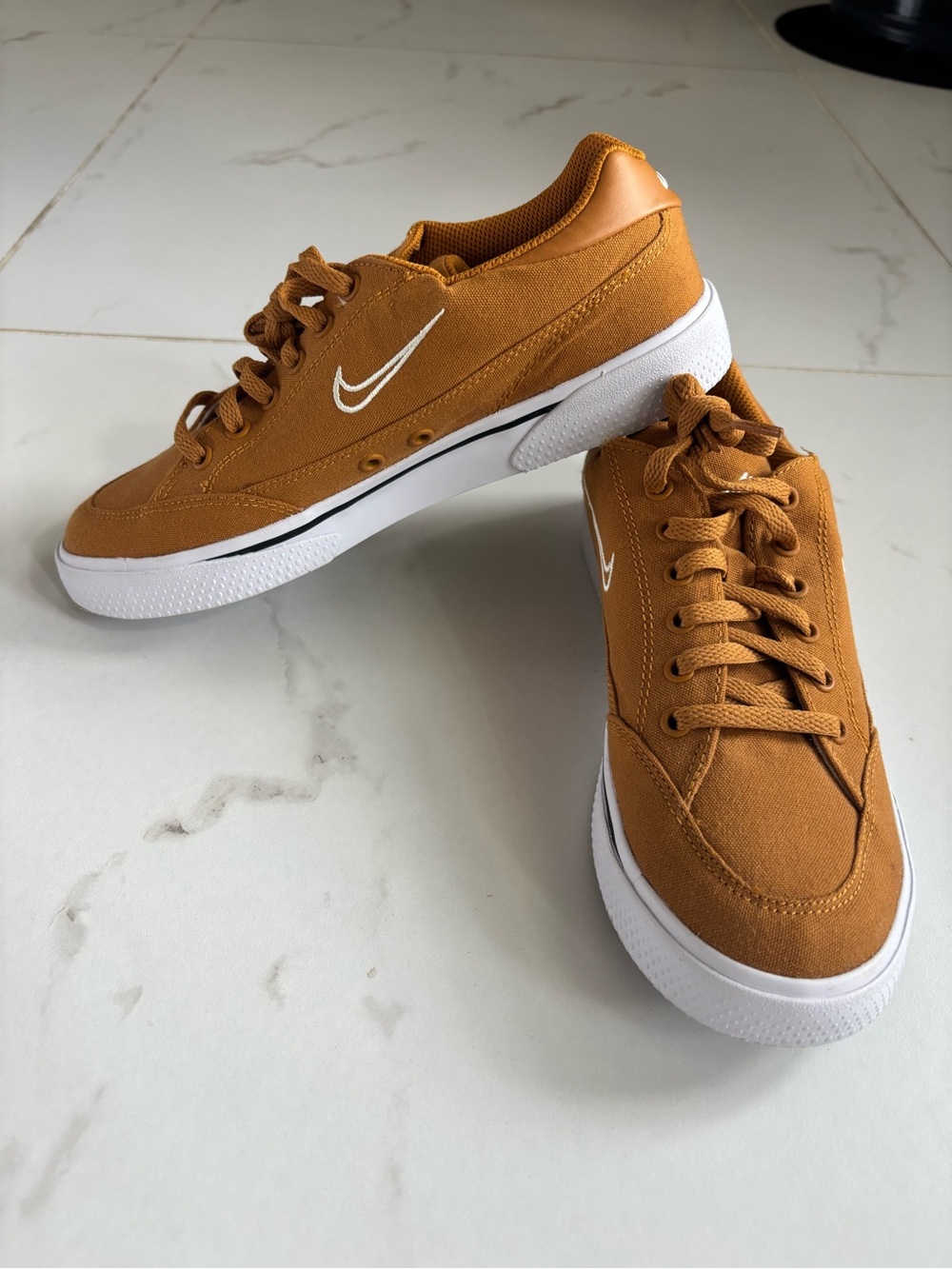 Nike Low-Top Sneakers in Tan with White Swoosh